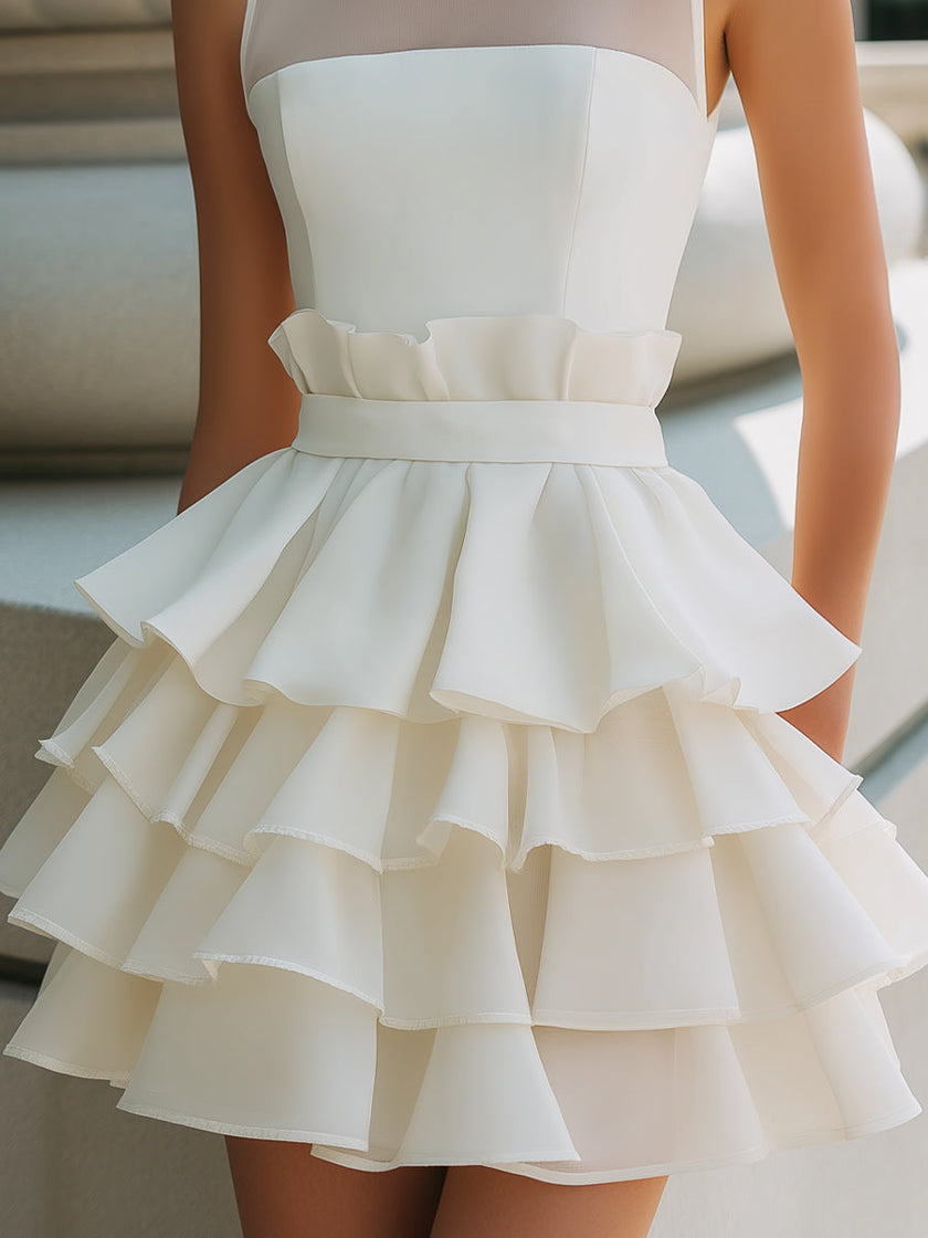 FJØRNA high-neck sheer yoke tiered ruffle mini dress with long sleeves and layered skirt, stylish and elegant for special occasions.