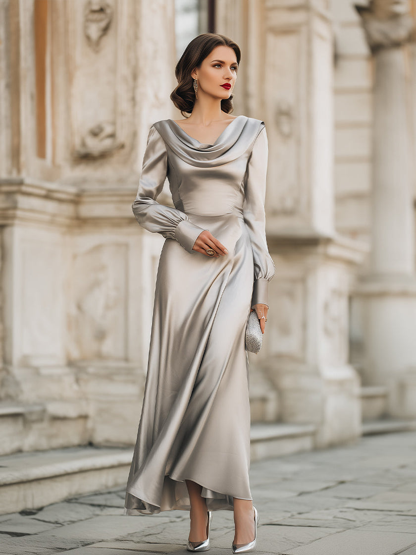 FJØRNA draped cowl neck long evening gown with sleeves, elegant maxi dress in flowing fabric, suitable for formal events.