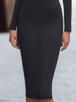 FJØRNA ribbed knit midi dress for women with keyhole detail, showcasing a fitted, stylish design perfect for casual or dressy occasions.