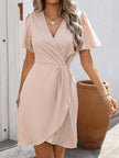 FJØRNA A-line short sleeve pleated mini dress with V-neck, split-joint zipper, solid color, and stylish design.