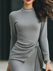 FJØRNA elegant knit midi dress with side tie detail, stylish and comfortable for casual or dressy occasions.
