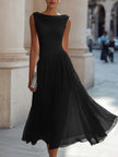 FJØRNA draped neck sleeveless pleated midi dress displayed on a hanger, showcasing its elegant fabric and flowy design.