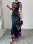 FJØRNA white sleeveless bodycon maxi dress with contrast color flower print and round neck, perfect for elegant summer wear