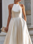FJØRNA halter-neck pleated midi dress for women, stylish and elegant with a flowing design and midi length, perfect for formal occasions.