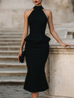 FJØRNA halter peplum midi dress for women, stylish sleeveless dress with fitted waist and flowing skirt, perfect for summer occasions.