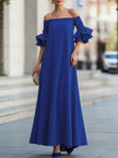 White FJØRNA off-the-shoulder maxi dress with half sleeves, loose fit, solid color, and elegant flowy design.