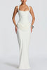 FJØRNA women's summer maxi dress with square neckline and bodycon fit, flowing fabric, and sleeveless design.