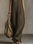 FJØRNA olive knit sleeveless maxi dress with casual fit, featuring a flowing silhouette and ribbed texture.
