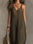 Olive green FJØRNA sleeveless knit maxi dress with a relaxed fit, casual style, and side slit detail.