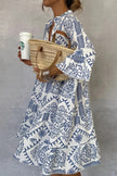 FJØRNA floral V-neck bell sleeve mini dress with vibrant print, stylish short dress perfect for spring and summer.