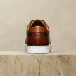 FJØRNA women's leather shoes featuring sleek design, rounded toes, and stylish black leather finish.
