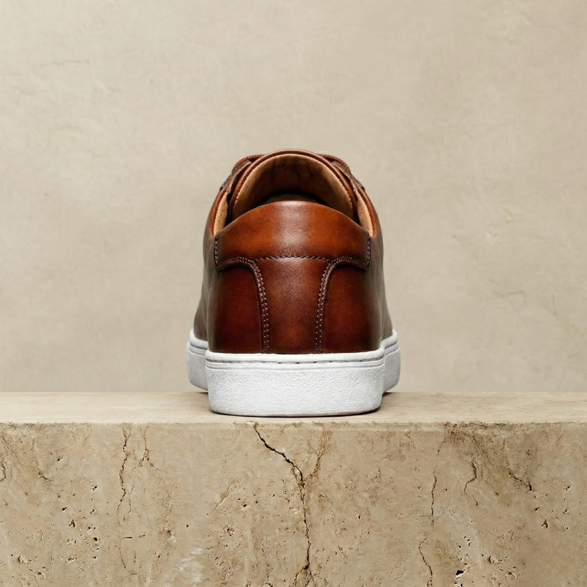 FJØRNA women's leather shoes featuring sleek design, rounded toes, and stylish black leather finish.
