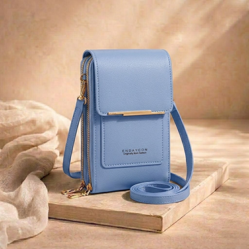 FJØRNA women's anti-theft travel crossbody bag with secure zippers and compact design, perfect for everyday use and travel.