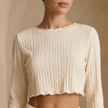 FJØRNA women's soft knit lounge co-ord set with a relaxed fit, featuring a cozy top and matching pants in neutral tones.