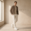 Men's breathable leather trainers by FJØRNA, showcasing stylish and comfortable shoes with leather uppers and athletic design.