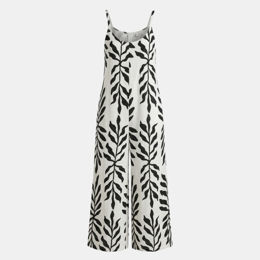 FJØRNA two-piece women's suit set with wide-leg pants and tropical print top, perfect for summer or casual outings.