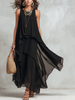 FJØRNA black bohemian layered chiffon maxi dress featuring flowing fabric and tiered design, perfect for casual or boho-style occasions.