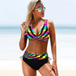 FJØRNA women's bikini set with a stylish wrap top and matching bottoms, perfect for beach or poolside lounging.
