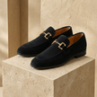 FJØRNA men's suede slip-on loafers, stylish and comfortable shoes with a classic design, shown in a close-up image.