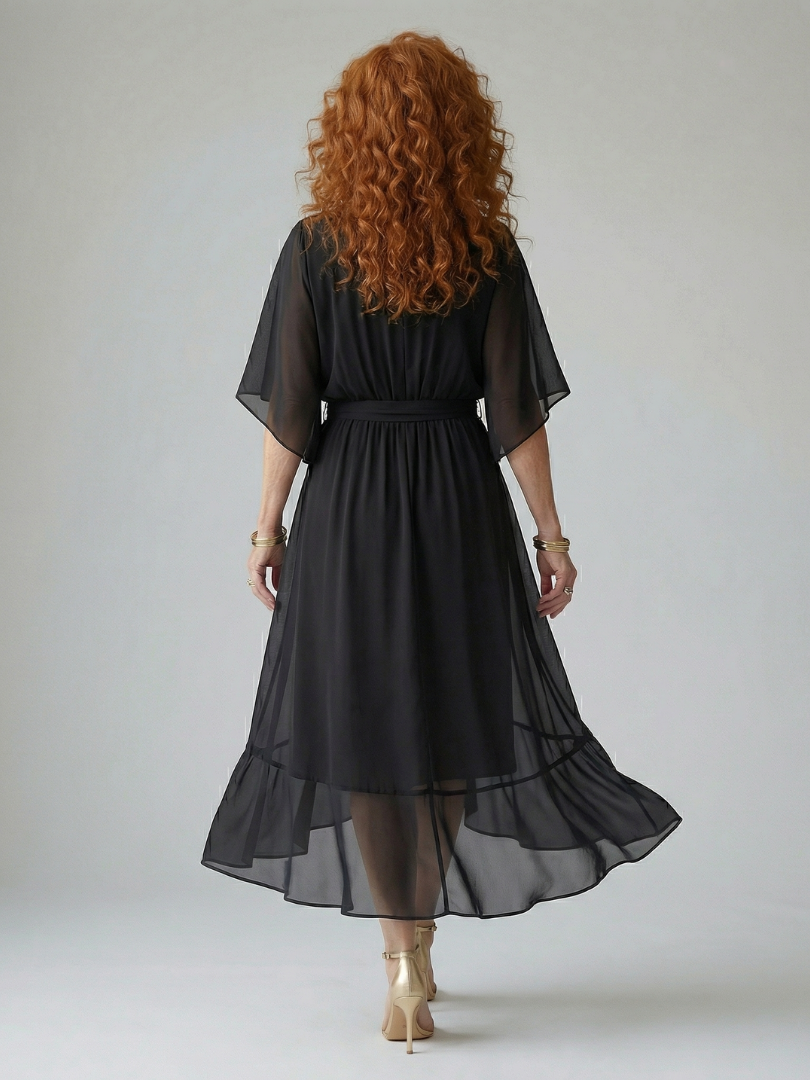 FJØRNA women's summer midi dress, flowy and lightweight, shown in a stylish design perfect for warm weather.