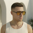 FJØRNA unisex retro aviator sunglasses with metal frames and dark lenses, stylish accessory for men and women.