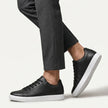 Men's FJØRNA leather lace-up low top sneakers with sleek design and white soles, showcasing stylish men's shoes.