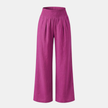FJØRNA linen blend wide-leg women's trousers with elastic waistband, relaxed fit, and casual style, shown on a model.