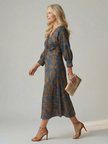 FJØRNA women's summer midi dress with long sleeves, wrap design, flowy fabric, perfect for warm weather and casual occasions.