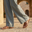 FJØRNA women's high waist wide leg trousers with elastic waistband, tailored and flowing for a stylish, comfortable look.