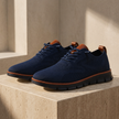 FJØRNA men's breathable mesh trainers showing lightweight design and black and white color scheme.