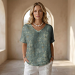 FJØRNA men's top featuring a casual, stylish design with a comfortable fit, displayed on a neutral background.