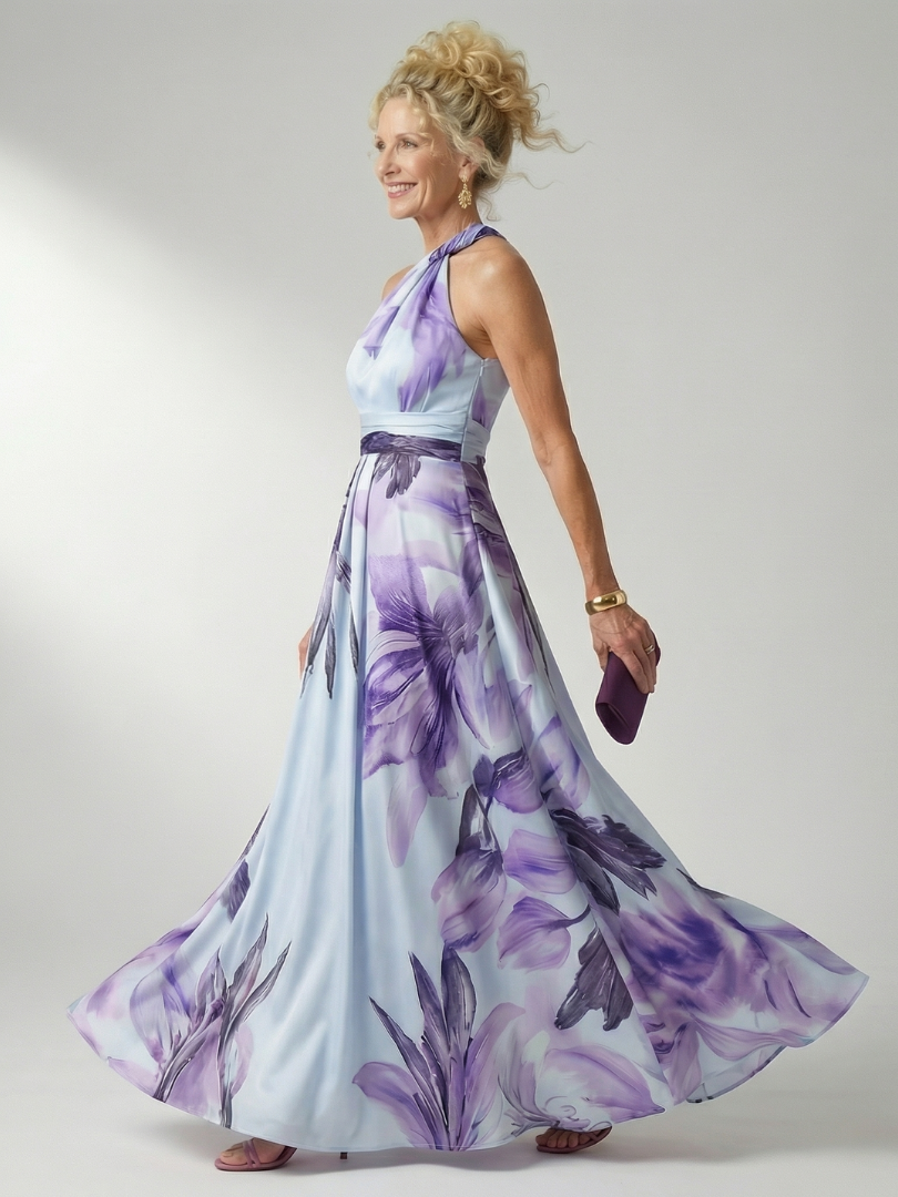 FJØRNA women's summer maxi dress with floral print, halter neck, sleeveless design, flowing fabric for warm-weather style.