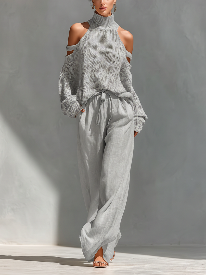 Women's beige linen-blend high-waisted wide-leg trousers with front pockets, stylish and comfortable FJØRNA women’s clothing.