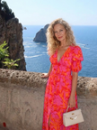FJØRNA women's summer midi dress with floral pattern and puff sleeves, stylish and lightweight for warm weather.
