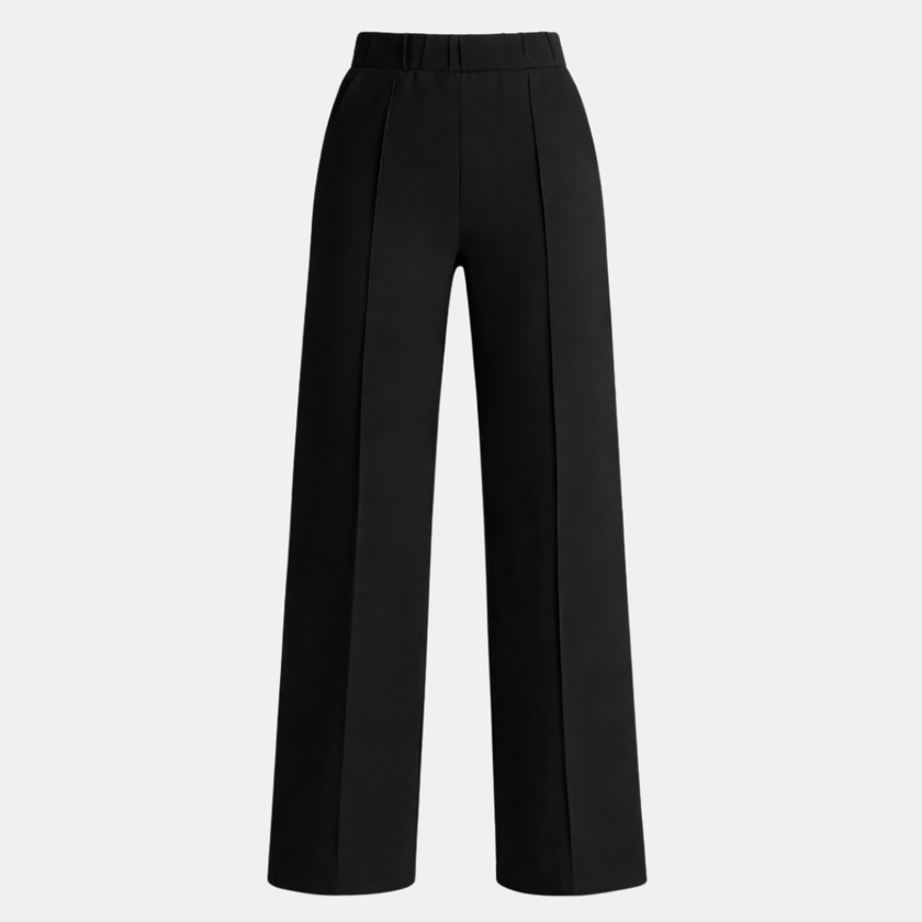 FJØRNA women's high waist wide-leg tailored pants displayed on a model with neutral background, showcasing the relaxed fit and fabric.