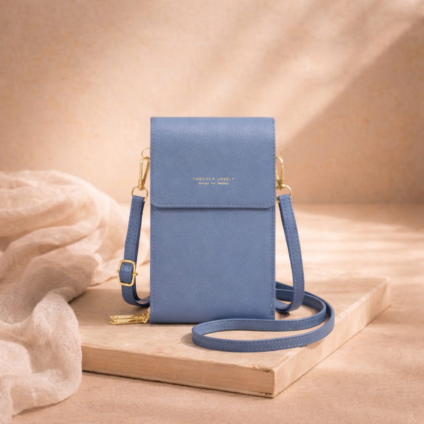 FJØRNA women's crossbody bag with adjustable strap, stylish design, and multiple compartments for everyday use.