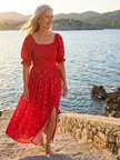 FJØRNA women's floral summer midi dress with square neckline and puff sleeves, perfect for warm weather and casual outings.