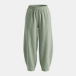 FJØRNA women's cotton linen wide leg trousers with relaxed fit, showing flowy fabric and high waist on a neutral background.