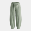 FJØRNA women's cotton linen wide leg trousers with relaxed fit, showing flowy fabric and high waist on a neutral background.
