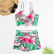 FJØRNA women's printed tankini set with flattering fit, featuring colorful pattern and supportive swim top and bottoms.
