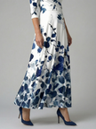 FJØRNA women's floral summer maxi dress with long sleeves, wrap style, flowy fabric, perfect for warm weather and outdoor events.
