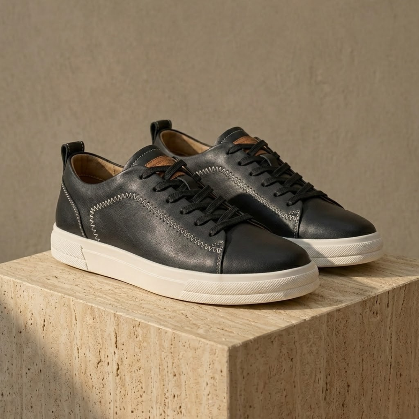 FJØRNA men's suede trainers, stylish casual shoes with beige suede uppers and white rubber soles, perfect for everyday wear.