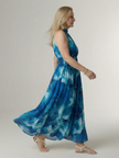 FJØRNA women's summer midi dress with halter neck, sleeveless casual style, lightweight fabric, and relaxed fit.