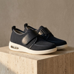 Red mesh men's trainers by FJØRNA with breathable fabric and velcro straps, ideal for comfortable casual wear.