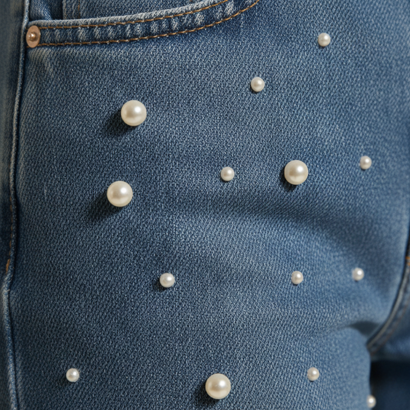 Relaxed fit baggy denim jeans for women by FJØRNA, showcasing the casual, comfortable style and classic blue denim fabric.