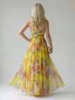 FJØRNA women's sleeveless wrap summer maxi dress with floral pattern, flowing fabric, and V-neck style.