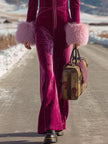 Rose red velvet faux fur collar flared jumpsuit by FJØRNA, featuring a stylish one-piece design with a flattering fit.