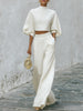 Cream textured lantern sleeve two-piece pants set by FJØRNA featuring stylish lantern sleeves and a coordinated matching design.