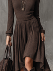 FJØRNA retro high-neck long-sleeved ribbed knitted midi dress displayed on model, showcasing classic style and textured fabric.