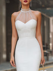 White sheer halter neck midi sheath dress by FJØRNA, featuring elegant sheer fabric and a fitted sleeveless design.